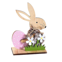 Easter bunny with an egg and pink flowers