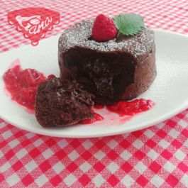 Gluten-free chocolate souffle with raspberry sauce